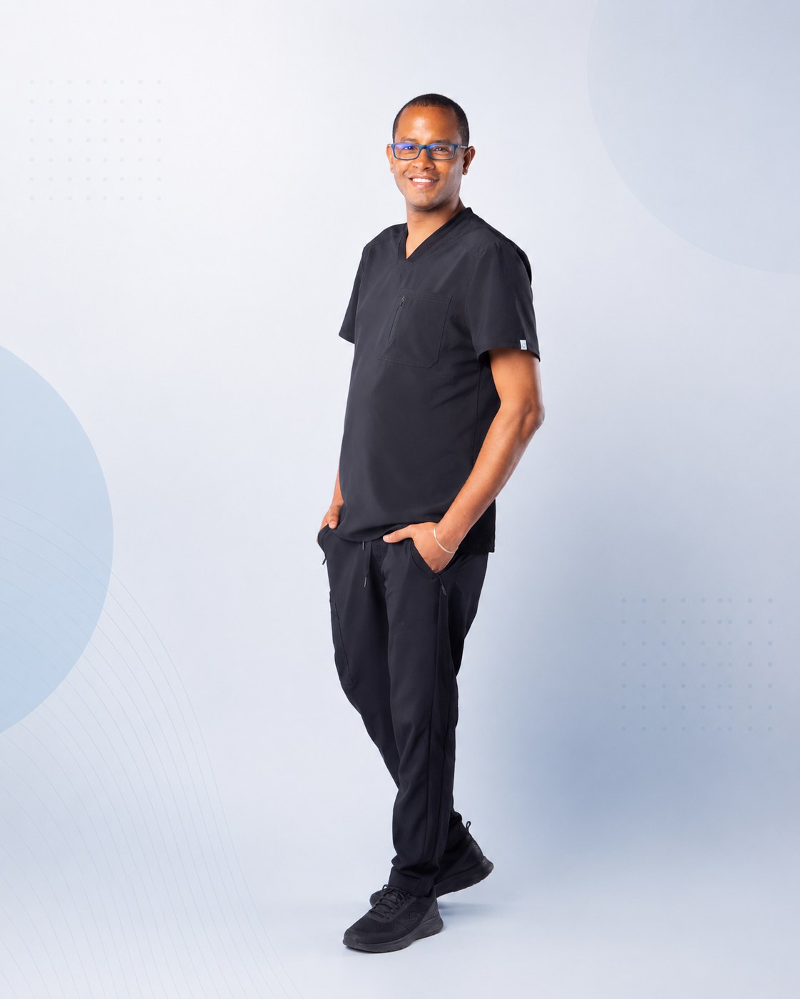 Dr. Rickart Peguero, cirujano general, en retrato profesional